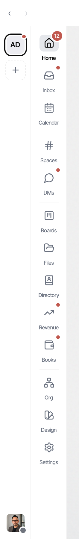 The rail with a numeric pill on Inbox and Home, dots on Spaces and DMs, and an unread-activity dot on another workspace tile